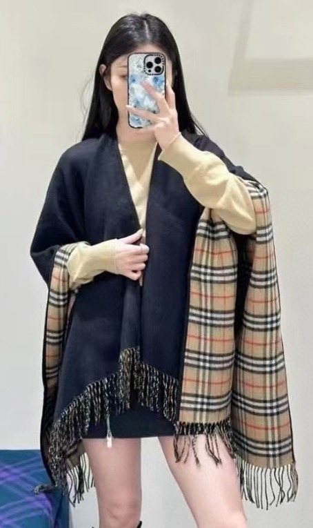 Burberry Reversible Plaid Fringed Poncho Wrap — model